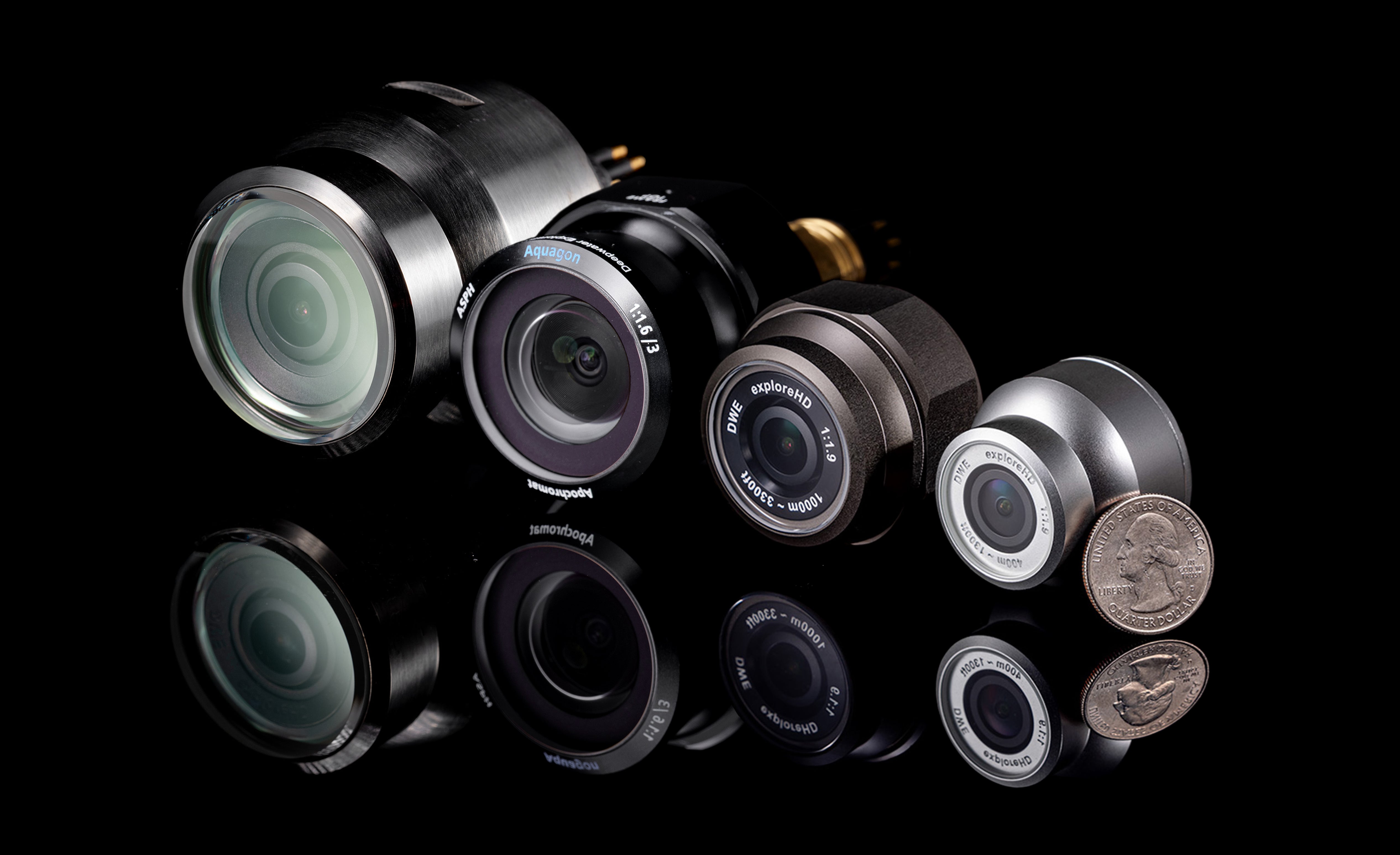 DeepWater Exploration's range of optical solutions for subsea imaging, showcasing various exploreHD and Aquagon™ lenses. These components for underwater camera systems are designed for ROV and AUV use, ensuring high-definition reliable imaging and exceptional image quality for ocean science and demanding industrial applications.