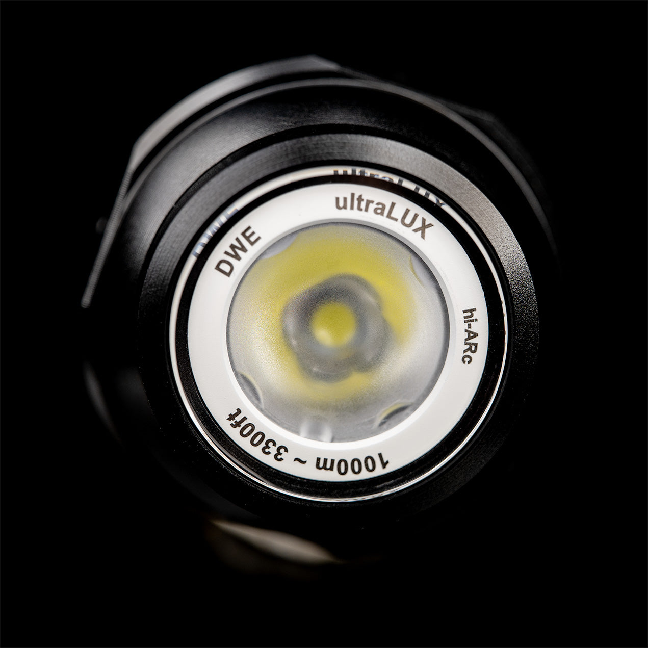 Front view of the DeepWater Exploration (DWE) aquaLUX subsea LED light, highlighting its robust lens with 'hi-ARc' (high anti-reflective coating) and its 1000m (3300ft) depth rating. This powerful underwater light is engineered by dwe.ai for exceptional illumination in demanding marine environments, ideal for ROV and AUV applications.