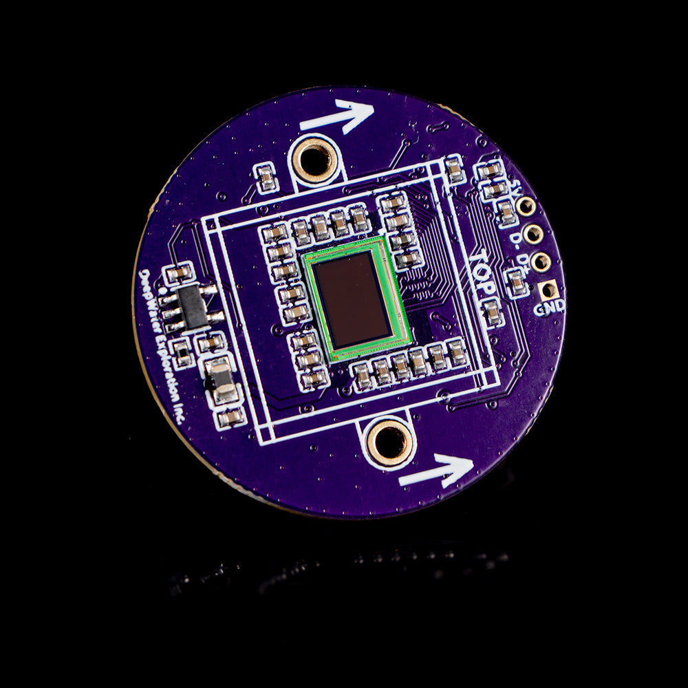 Close-up of the exploreHD custom PCB with an integrated high-resolution image sensor, designed for underwater vision systems. Featuring precision electronics and advanced processing capabilities, this board enables low-latency, AI-enhanced imaging for subsea robotics and marine applications.