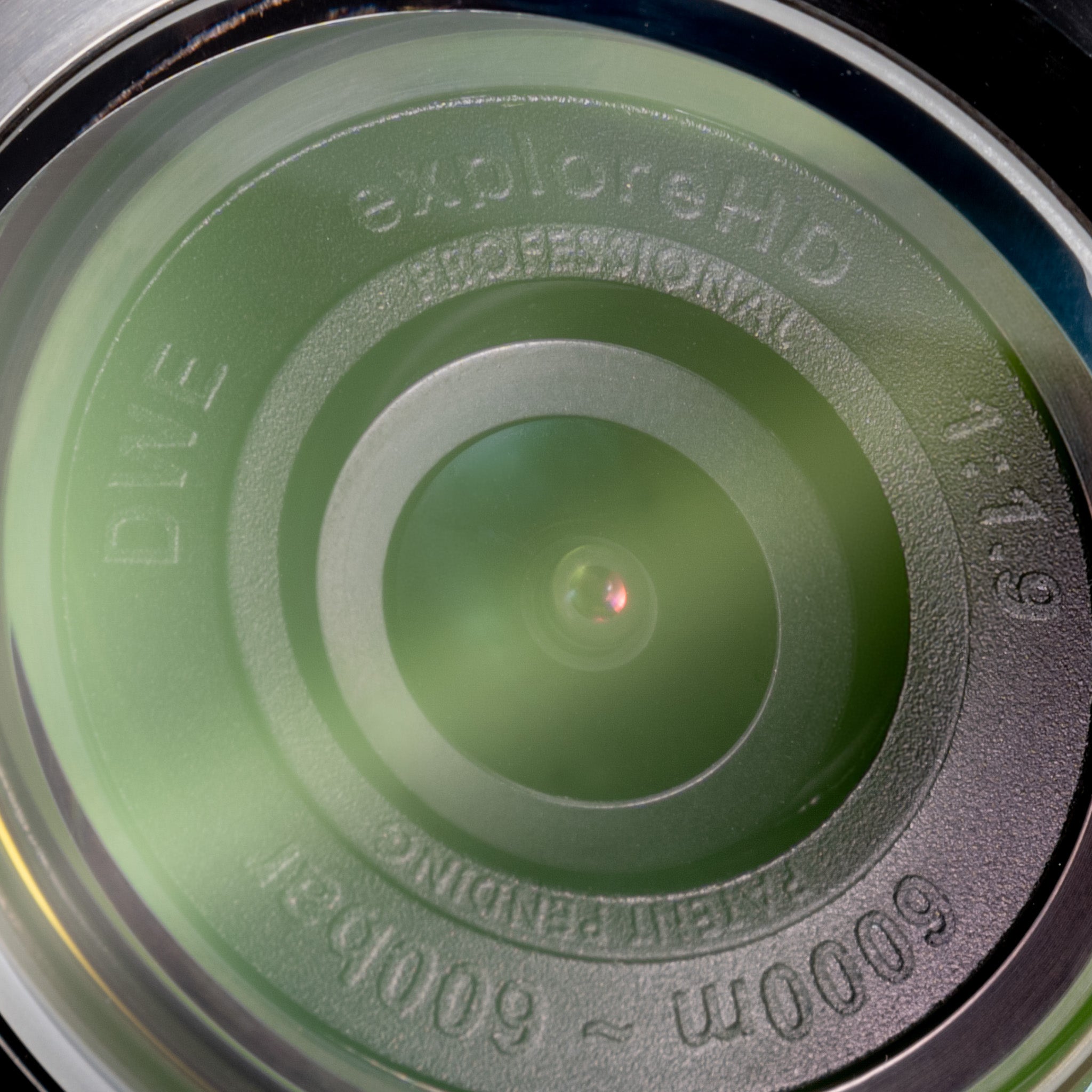 Extreme close-up of the exploreHD Professional underwater camera lens, designed for deep-sea imaging up to 6000 meters. Featuring corrosion-resistant optics and high-resolution imaging, this lens is ideal for marine infrastructure inspection, defense applications, and industrial robotics in harsh environments.