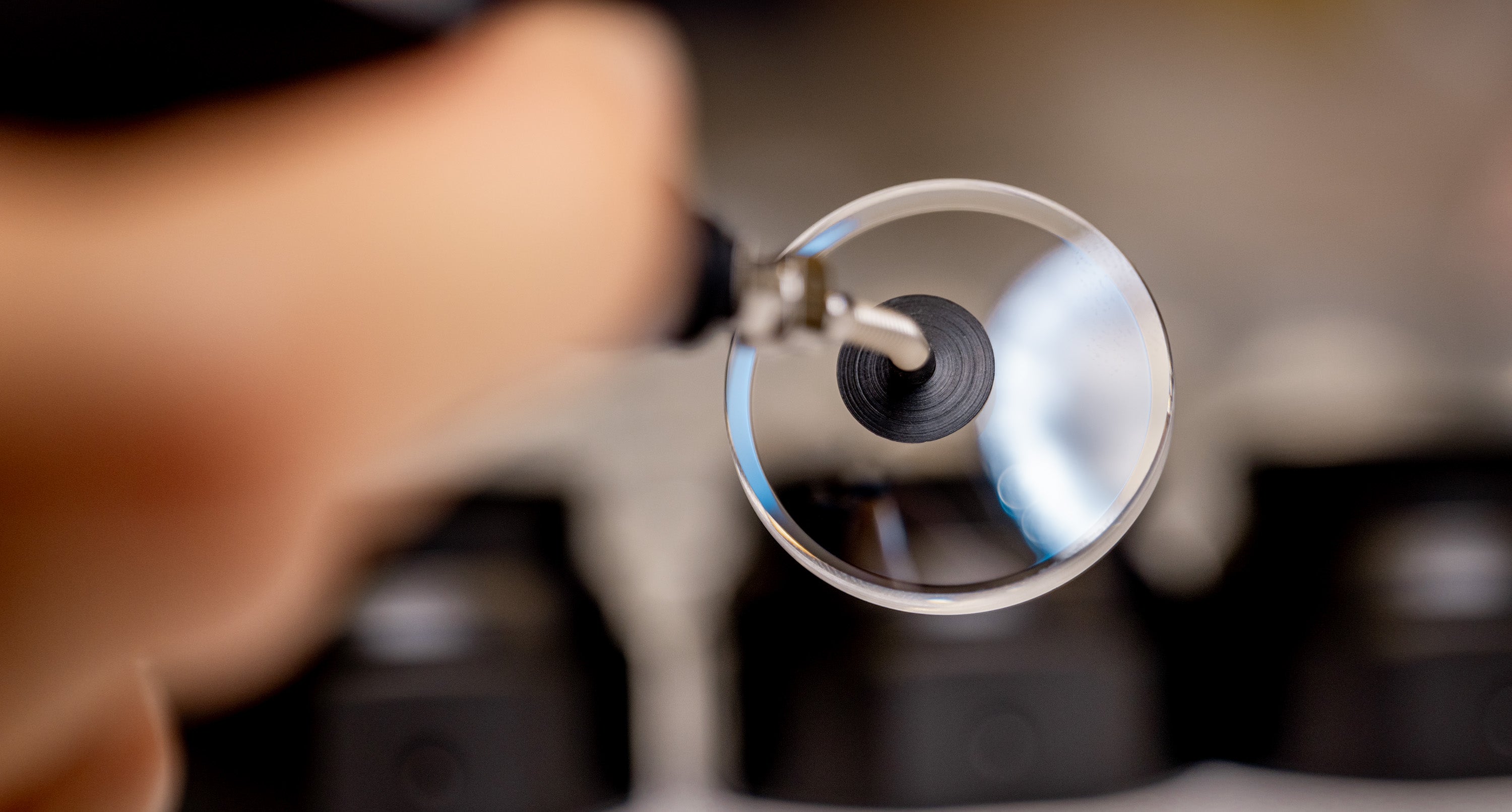 A precision underwater camera lens undergoing manufacturing and quality inspection, ensuring optical clarity and durability for ROVs, AUVs, and ASVs. Designed with anti-reflective sapphire glass, this lens enhances subsea imaging and low-light performance in harsh marine environments.